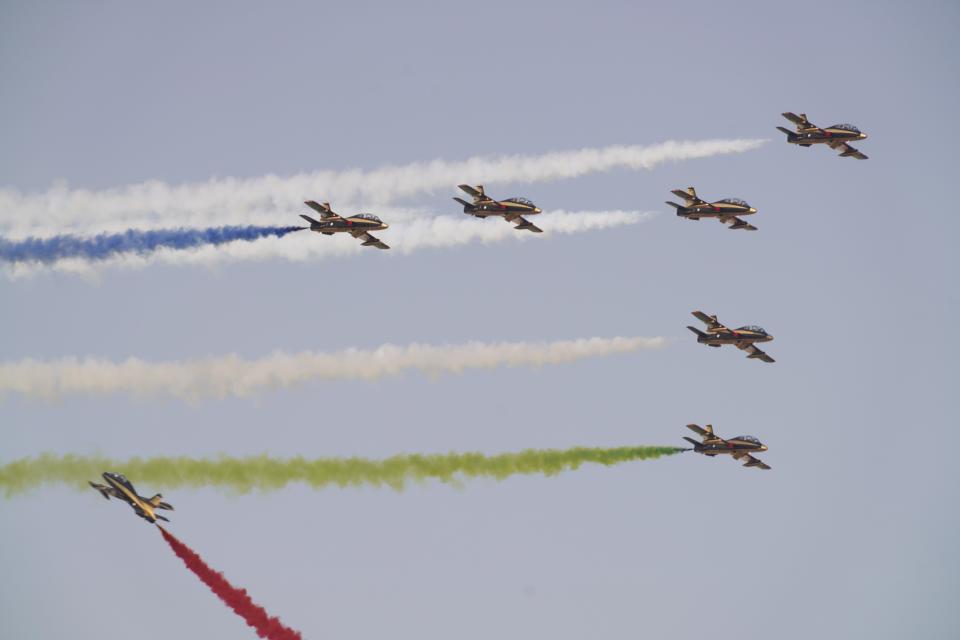 Al Fursan, the United Arab Emirates Air Force's aerobatic team, performs at the Dubai Air Show in Dubai, United Arab Emirates, Wednesday, Nov. 17, 2021. (AP Photo/Jon Gambrell)