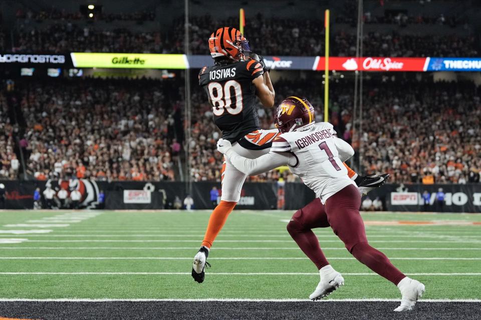 Cincinnati Bengals receiver Andrei Iosivas catches a touchdown pass against the Washington Commanders on Sept. 23, 2024.