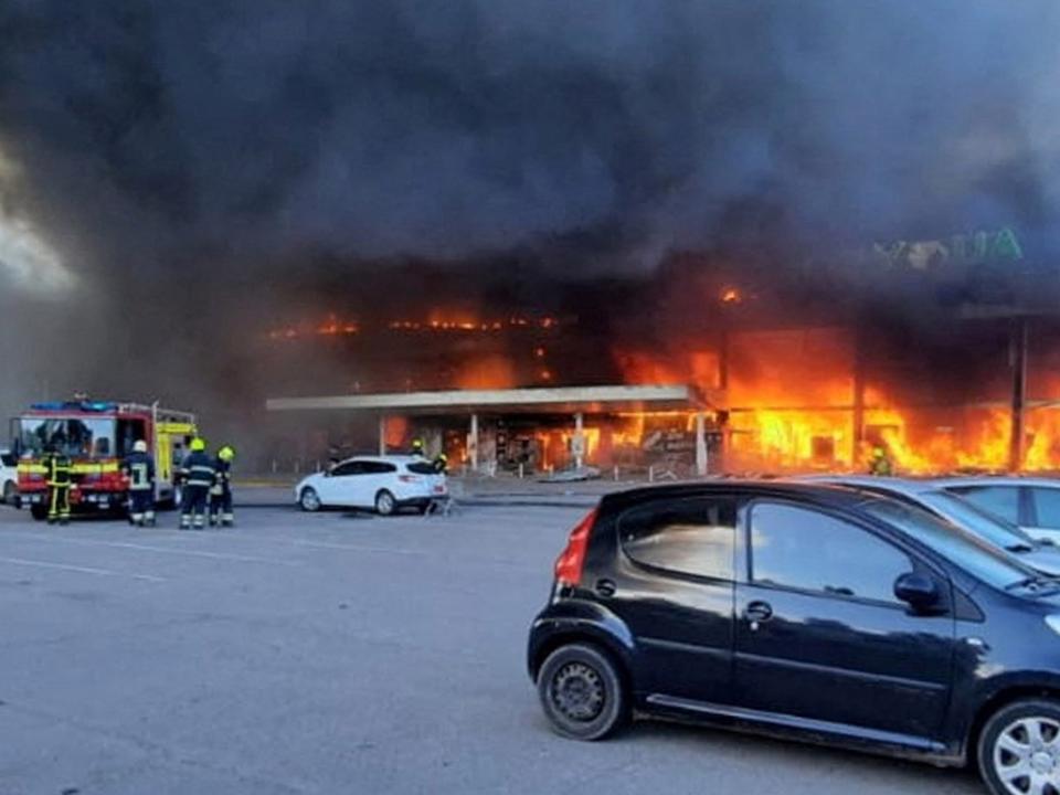 Shopping centre in Kremenchuk ablaze after a missile hit the building (Press service of the State Emergency Service of Ukraine/Reuters)