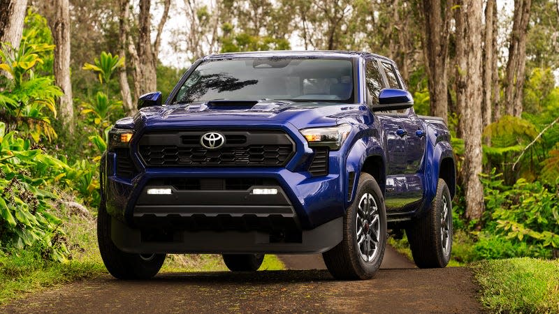 Front view of blue 2024 Toyota Tacoma