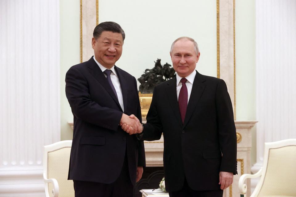 TOPSHOT - Russian President Vladimir Putin meets with China's President Xi Jinping at the Kremlin in Moscow on March 20, 2023. (Photo by Sergei KARPUKHIN / SPUTNIK / AFP) (Photo by SERGEI KARPUKHIN/SPUTNIK/AFP via Getty Images)