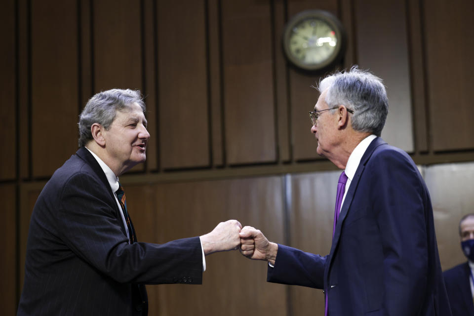 Sen. John Kennedy, R-La., greets Federal Reserve Chairman Jerome Powell before a Senate Banking, Housing and Urban Affairs Committee hearing on the CARES Act on Capitol Hill, Tuesday, Sept. 28, 2021 in Washington. (Kevin Dietsch/Pool via AP)