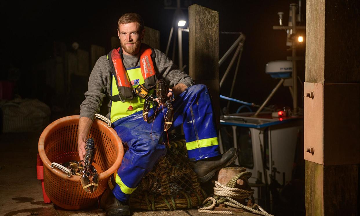 <span>Hayden Scamp, photographed mid-shift for OFM at Axmouth harbour on 1 August.</span><span>Photograph: Adrian Sherratt/The Observer</span>