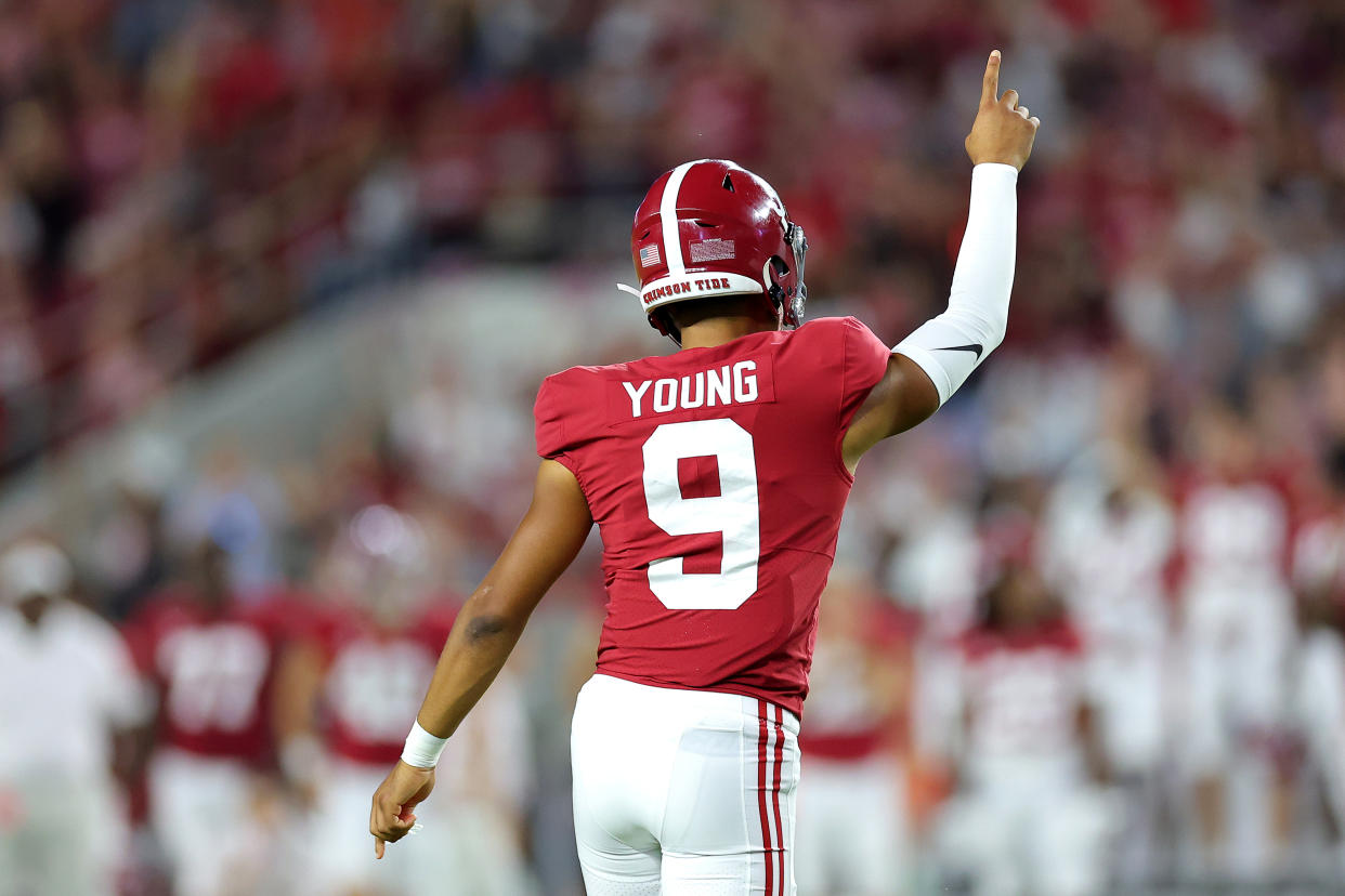 TUSCALOOSA, ALABAMA - SEPTEMBER 24: Bryce Young #9 of the Alabama Crimson Tide celebrates a touchdown to Traeshon Holden #11 against the Vanderbilt Commodores during the first half of the game at Bryant-Denny Stadium on September 24, 2022 in Tuscaloosa, Alabama. (Photo by Kevin C. Cox/Getty Images)