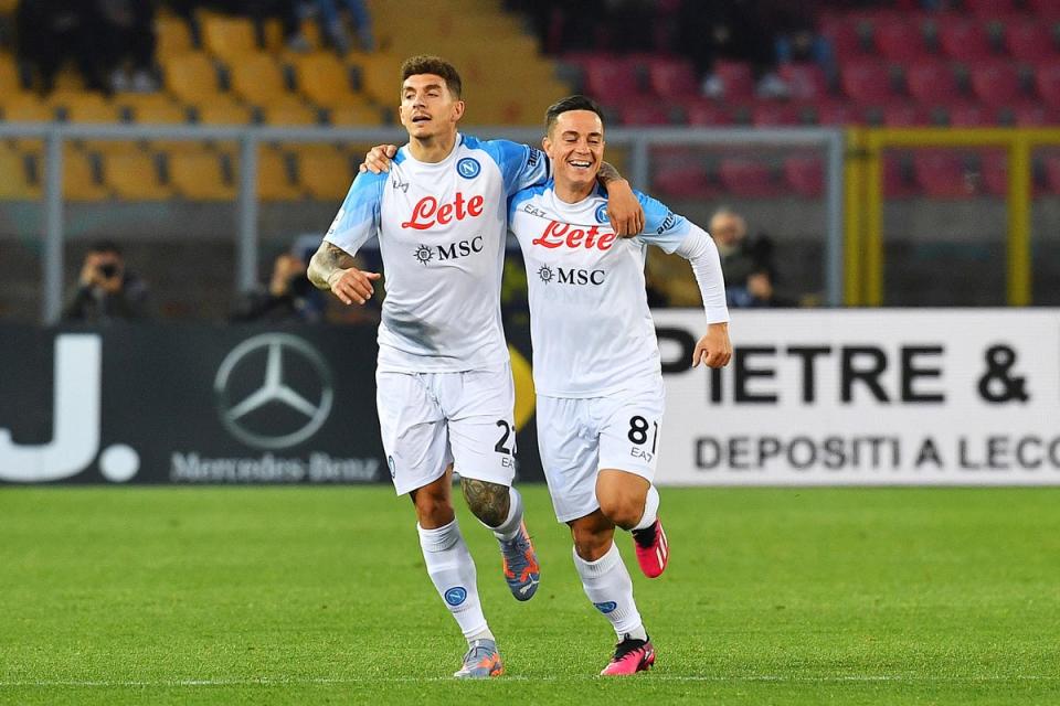 Napoli’s Giovanni Di Lorenzo (left) celebrates with teammate Giacomo Raspadori after scoring in the Serie A leaders’ 2-1 win at Lecce (Giovanni Evangelista/LaPresse via AP) (AP)
