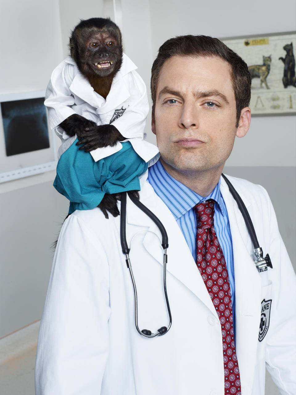 This image released by NBC shows Crystal as Dr. Zaius, Justin Kirk as Dr. George Coleman -from the NBC comedy "Animal Practice," premiering Sept. 26 at 8 p.m. EST. (AP Photo/NBC, Chris Haston)