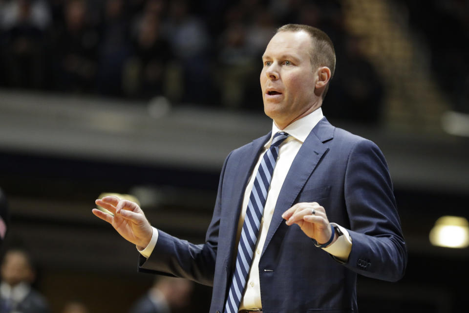 Xavier head coach Travis Steele gestures in the first half of an NCAA college basketball game against Butler in Indianapolis, Wednesday, Feb. 12, 2020. (AP Photo/Michael Conroy)