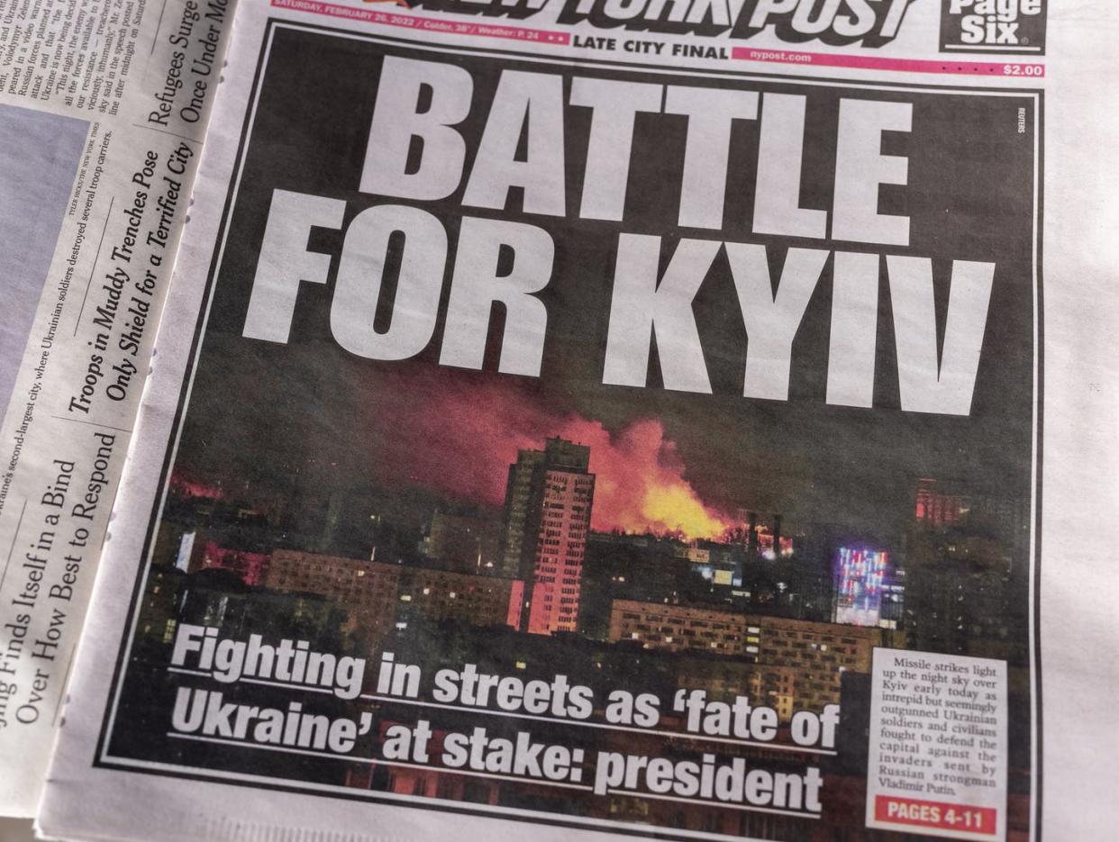 <span class="caption">The front-page of the New York Post following a missile strike in Kyiv, Ukraine, on Feb. 26, 2022.</span> <span class="attribution"><a class="link " href="https://www.gettyimages.com/detail/news-photo/the-front-page-of-the-new-york-post-shows-a-picture-of-the-news-photo/1373108511?adppopup=true" rel="nofollow noopener" target="_blank" data-ylk="slk:Photo by Robert Nickelsberg/Getty Images;elm:context_link;itc:0;sec:content-canvas">Photo by Robert Nickelsberg/Getty Images</a></span>