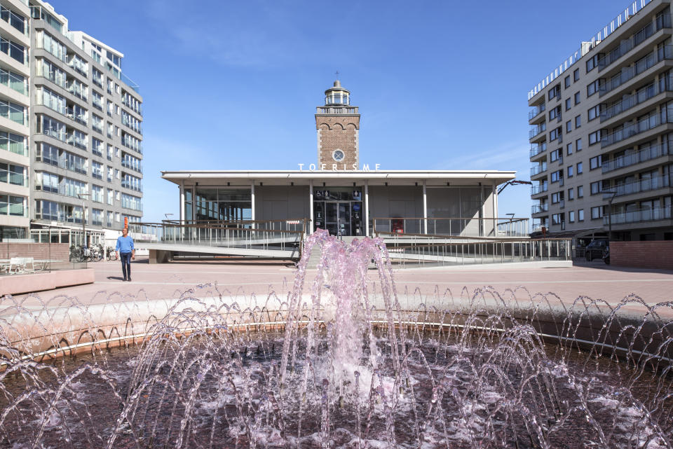 Pink fountain in front of the lighthouse and tourist office at seaside resort Knokke-Heist along the North Sea coast, West Flanders, Belgium. (Photo by: Arterra/Universal Images Group via Getty Images)