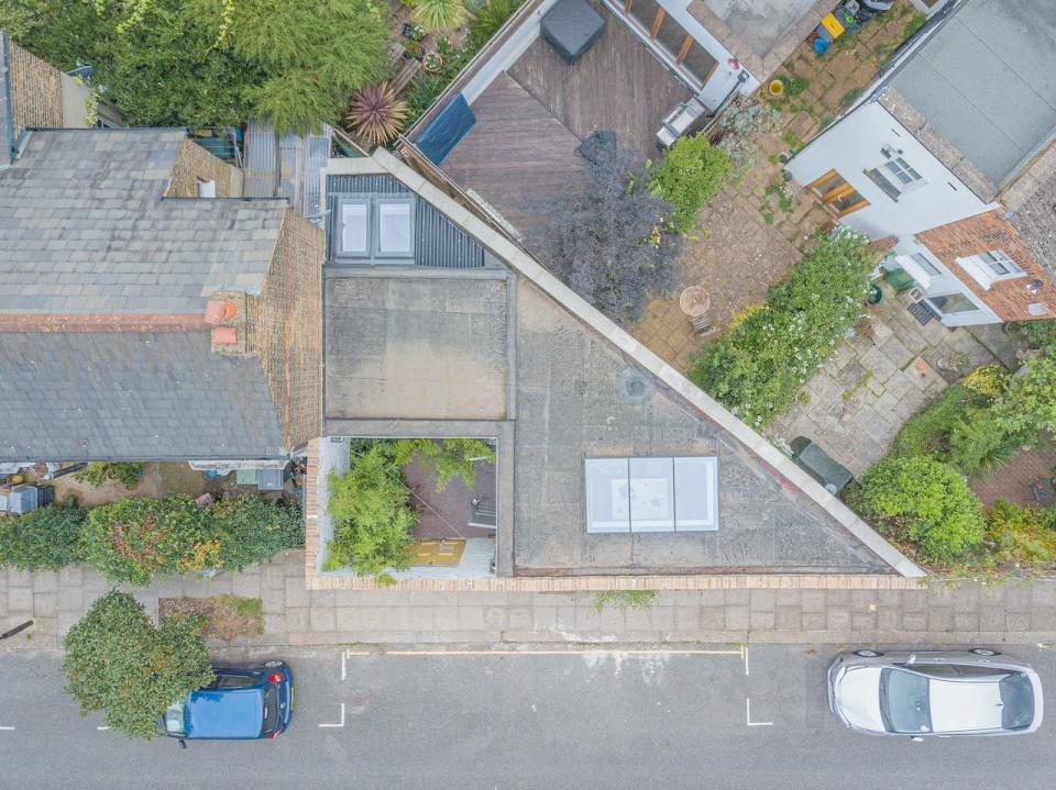 A bird's-eye view of a triangle-shaped house.