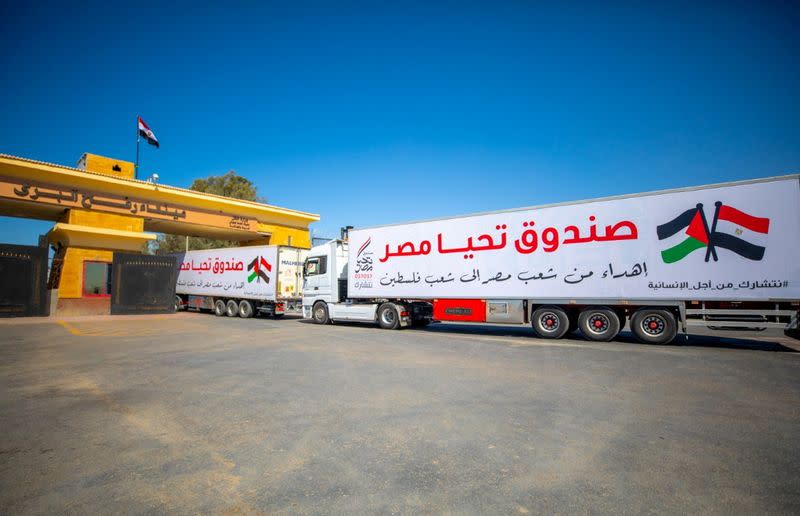 rFILE PHOTO: An aid convoy's trucks loaded with supplies send by Long Live Egypt Fund are seen at the Rafah border in Rafah