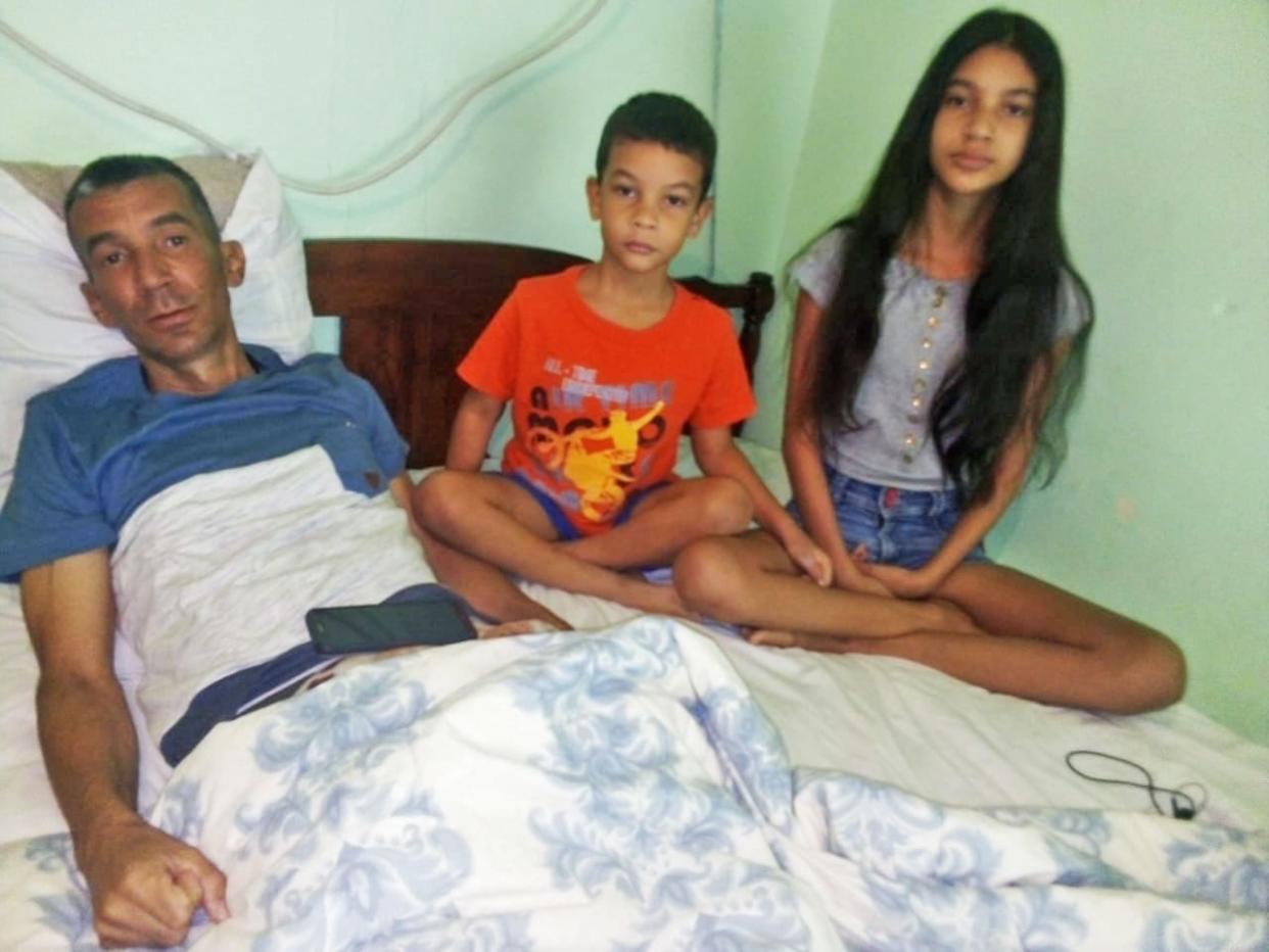 Ramon Arbolaez and his two youngest children, ages 12 and 6, in Reynosa, Mexico, in August 2020. (Courtesy Yaneisy Santana Hurtado)