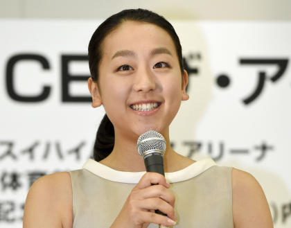 Japanese figure skater Mao Asada speaks during a press conference in Tokyo, Monday, May 18, 2015. Olympic silver medalist Asada will attempt a comeback to competitive skating after taking a year off from the sport. Speaking at a news conference Monday, Asada said she misses competition and decided by herself to attempt a comeback. (Kyodo News via AP) 