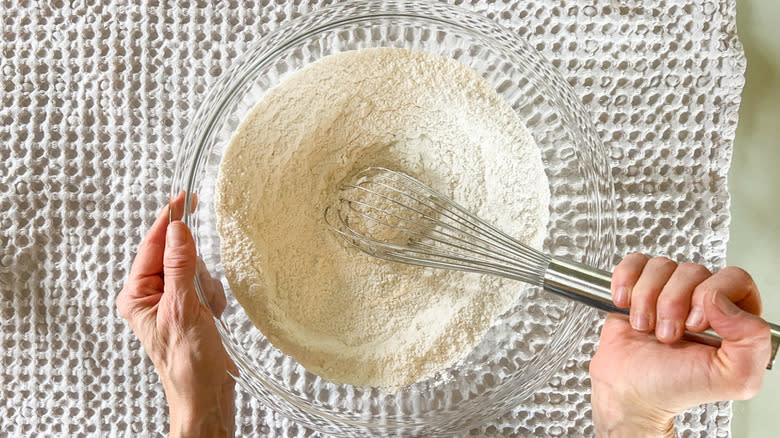 Whisking dry ingredients together for sunny lemon lavender cake