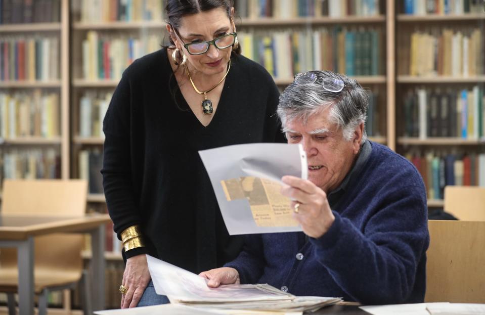 Tony Canales and daughter Barbara Canales look at files from the Dr. Clotilde P. García Collection at the Mary and Jeff Bell Library at Texas A&M University-Corpus Christi, on Feb. 28 in Texas.