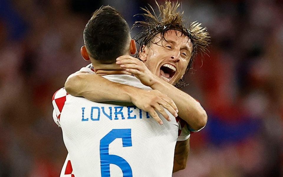 Croatia's Luka Modric and Dejan Lovren celebrate after the match - REUTERS