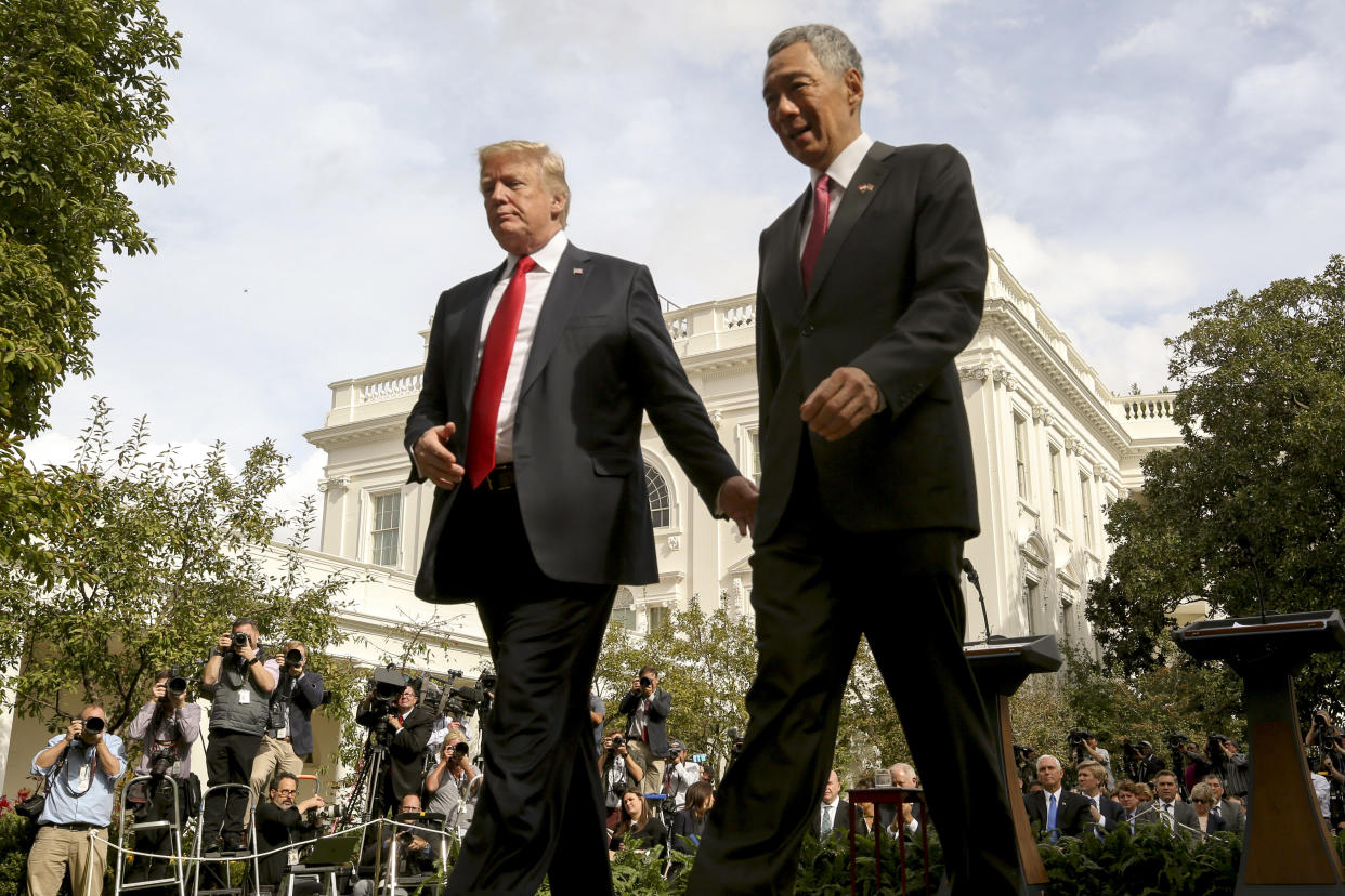 President Trump and Prime Minister Lee Hsien Loong departing together following a joint statement in the Rose Garden at the White House on Monday 23 Oct. (Photo: AP)