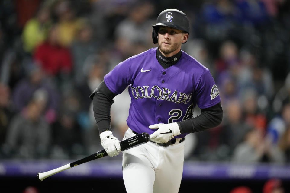 Colorado Rockies' Ryan McMahon heads up the first-base line after hitting a three-run home run off Cincinnati Reds starting pitcher Hunter Greene during the fifth inning of a baseball game Friday, April 29, 2022, in Denver. (AP Photo/David Zalubowski)