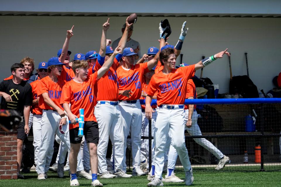 Olentangy Orange celebrates when senior Cole Cahill drives in senior Ian Dando during a regional semifinal win over Olentangy Liberty. The Pioneers have 17 seniors on their roster.