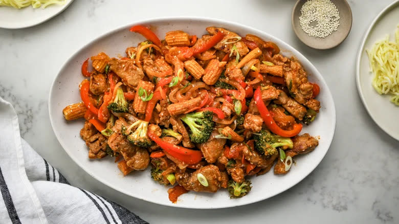 Meat stir-fry with corn, broccoli, bell peppers