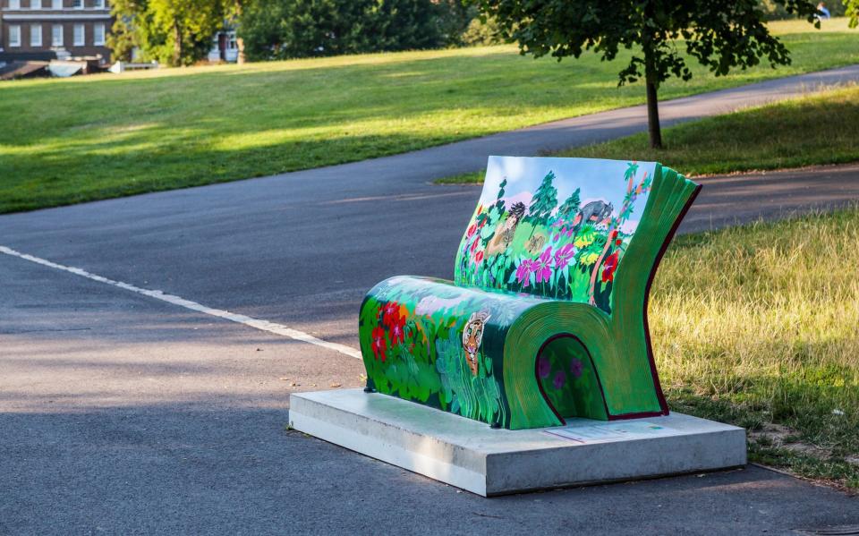 one of the National Trust’s ‘BookBench’ sculptures, part of a literacy drive - Alamy