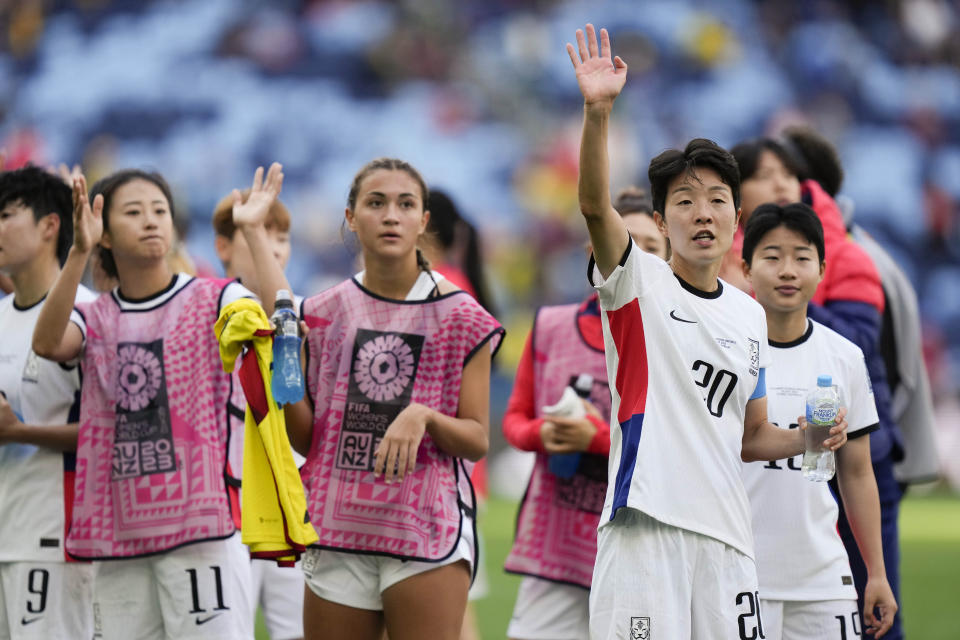 Soth Korea's players react after losing the Women's World Cup Group H soccer match against Colombia at the Sydney Football Stadium in Sydney, Australia, Tuesday, July 25, 2023. (AP Photo/Rick Rycroft)