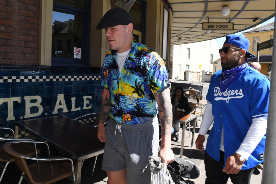 Former Canterbury Bankstown Bulldogs players David Klemmer (pictured left) and Tyrone Phillips (pictured right) arrive for Mad Monday celebrations in 2017. (AAP Image/Dean Lewins)