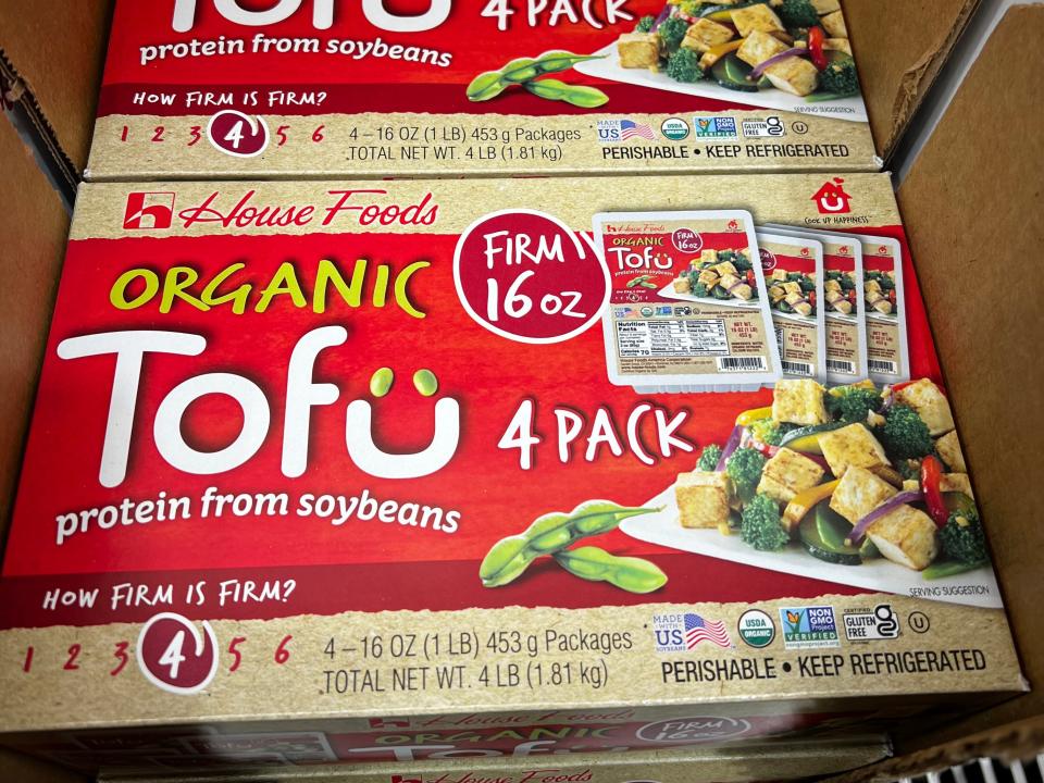 Boxes of House Foods organic tofu, which come in packs of four.
