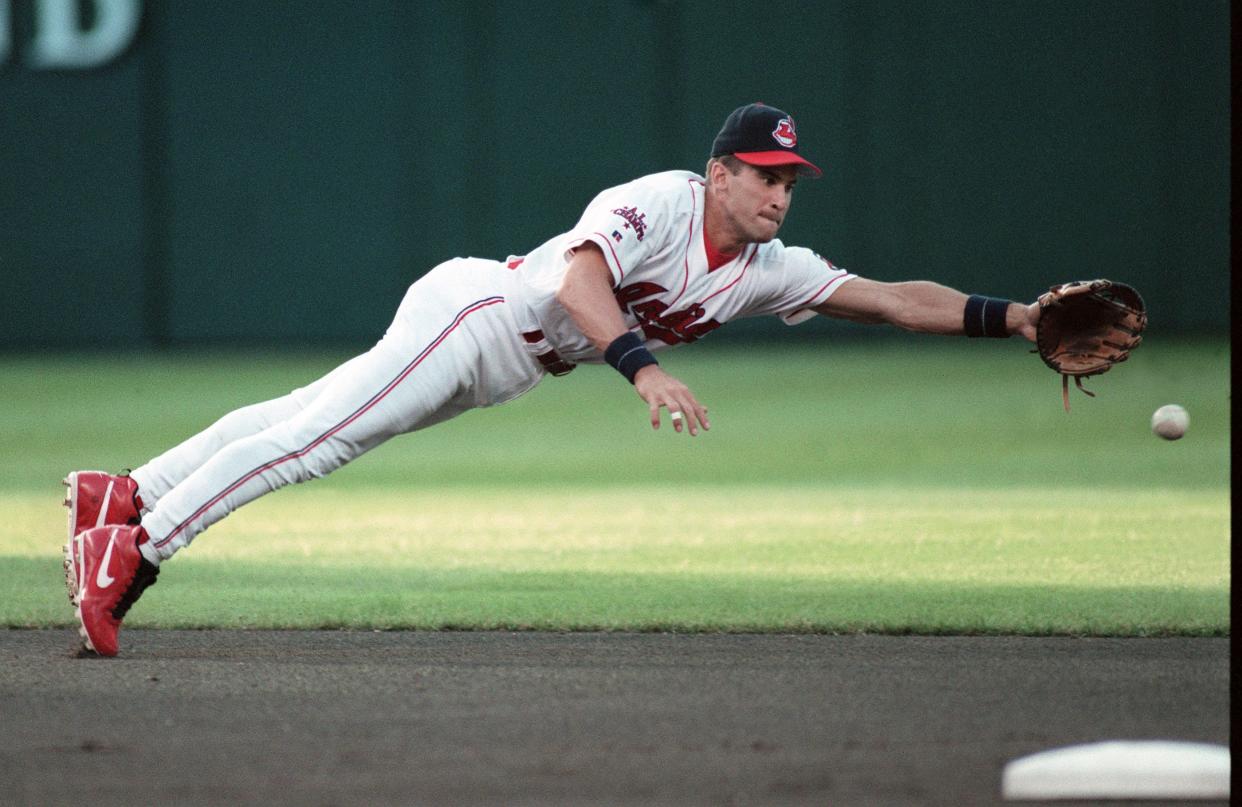 Aug 18, 1998; Cleveland, OH, USA; Cleveland Indians shortstop Omar Vizquel (13) dives for the ball at Jacobs Field. Mandatory Credit: David Richard-USA TODAY Sports