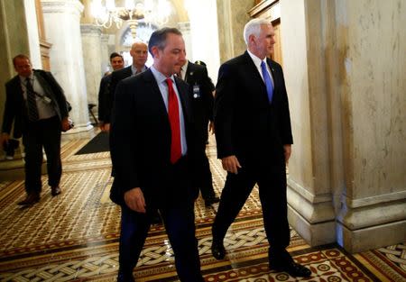 U.S. Vice President Mike Pence and White House Chief of Staff Reince Priebus arrive on Capitol Hill in Washington, U.S. July 25, 2017. REUTERS/Eric Thayer