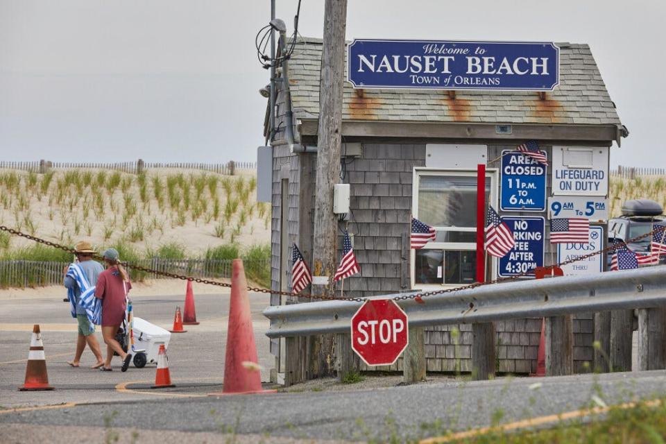 Summer visitors at the entrance to Nauset Beach in Orleans.
