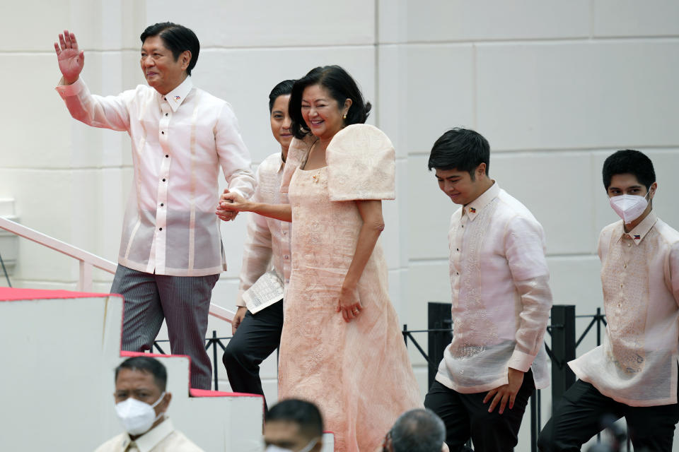 President-elect Ferdinand "Bongbong" Marcos Jr., left top, and his wife Maria Louise Marcos arrive for the inauguration ceremony at National Museum on Thursday, June 30, 2022 in Manila, Philippines. Marcos was sworn in as the country's 17th president. (AP Photo/Aaron Favila)