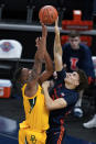 Baylor's Mark Vital, left, has his shot blocked by Illinois' Coleman Hawkins during the first half of an NCAA college basketball game, Wednesday, Dec. 2, 2020, in Indianapolis. (AP Photo/Darron Cummings)