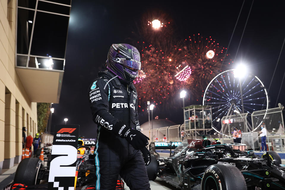 BAHRAIN, BAHRAIN - MARCH 28: Race winner Lewis Hamilton of Great Britain and Mercedes GP looks on in parc ferme during the F1 Grand Prix of Bahrain at Bahrain International Circuit on March 28, 2021 in Bahrain, Bahrain. (Photo by Lars Baron/Getty Images)