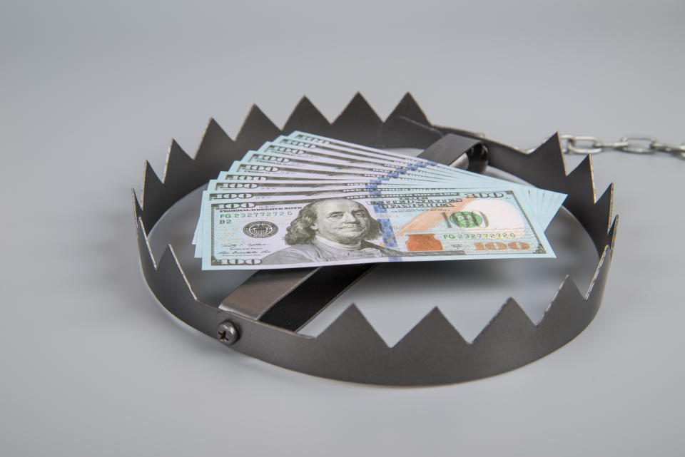 Business trap with dollar banknotes, money. Concept idea, situations, fraud. Catch bait