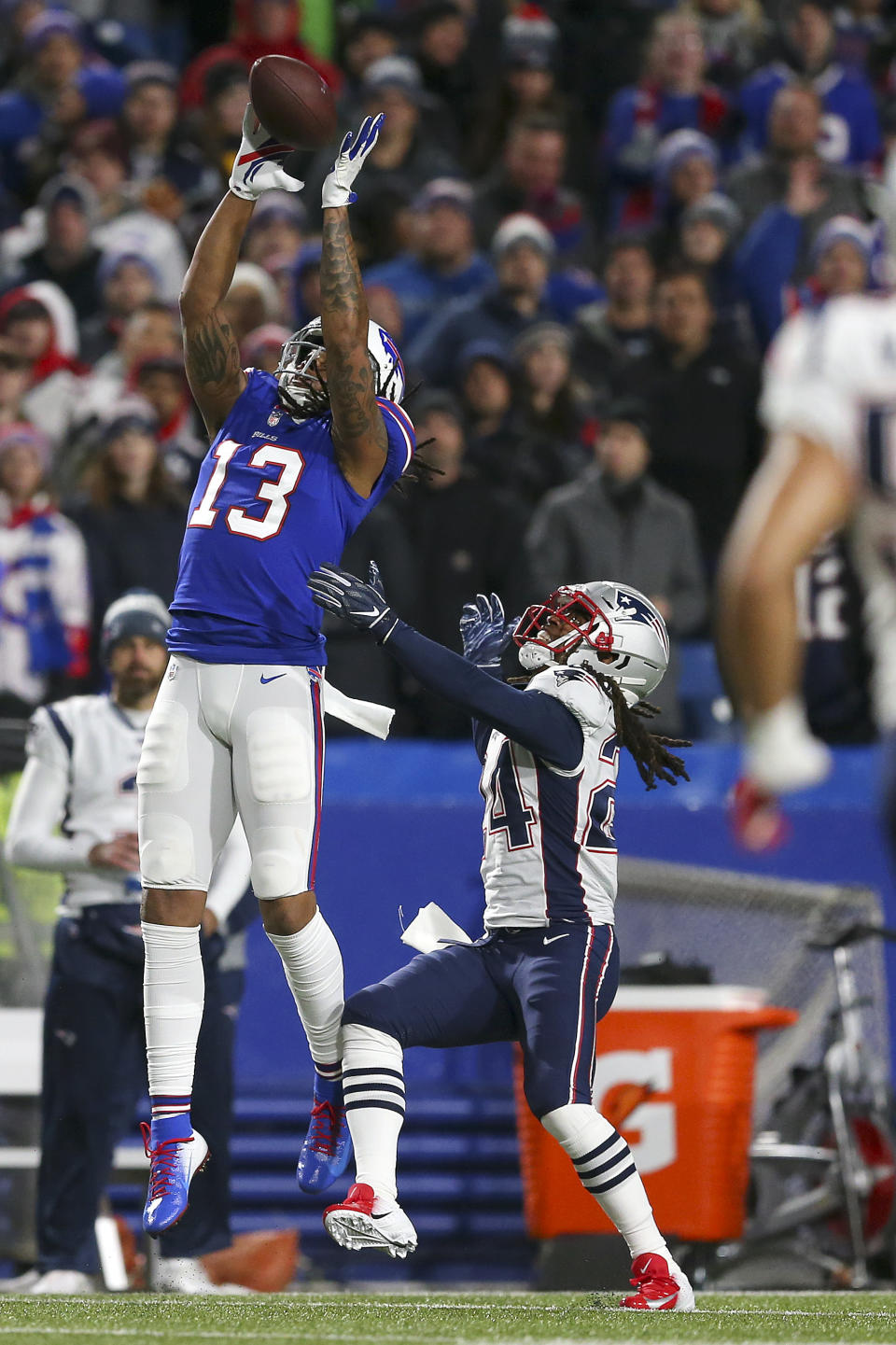 Buffalo Bills wide receiver Kelvin Benjamin (13) makes a catch against New England Patriots cornerback Stephon Gilmore (24) during the second half of an NFL football game, Monday, Oct. 29, 2018, in Orchard Park, N.Y. (AP Photo/Jeffrey T. Barnes)