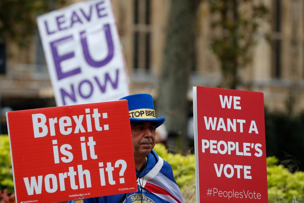 Pro and anti Brexit protesters near Parliament earlier this week: AP