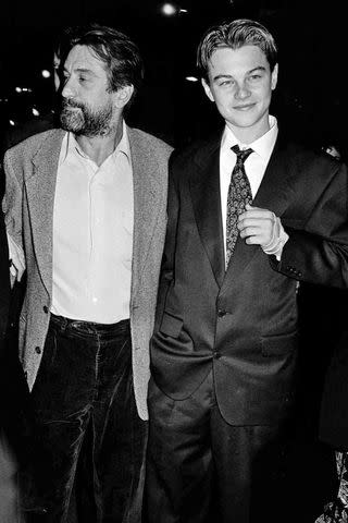 <p>Eric Weiss/WWD/Penske Media via Getty</p> Robert De Niro and Leonardo DiCaprio in 1993