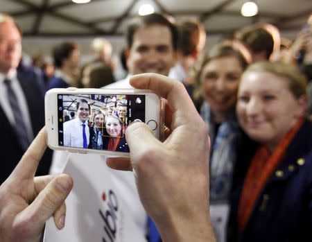 U.S. Republican presidential candidate Marco Rubio is photographed with supporters at a campaign rally in Raleigh, North Carolina January 9, 2016. REUTERS/Jonathan Drake