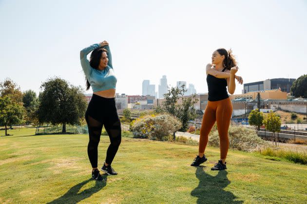 Stretching enhances your performance during workouts. (Photo: The Good Brigade via Getty Images)