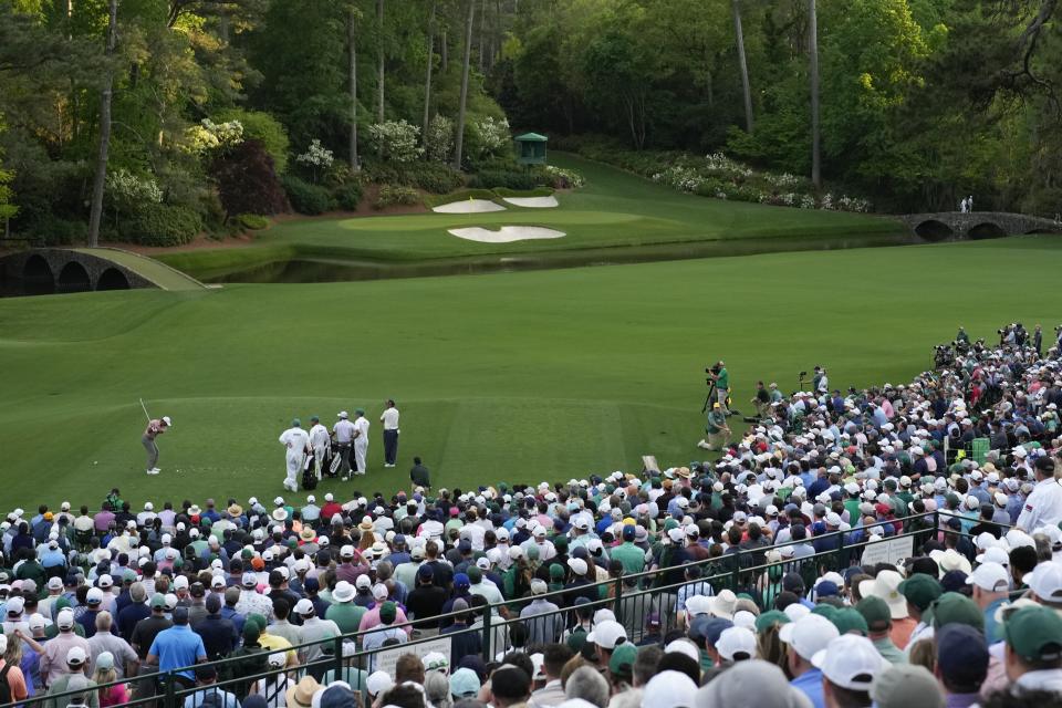 Tiger Woods hits his tee shot on the 12th hole during the first round at the Masters golf tournament at Augusta National Golf Club Thursday, April 11, 2024, in Augusta, Ga. (AP Photo/David J. Phillip)