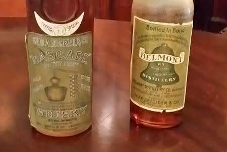 Rare bottles of Belmont (R) and Cascade Kentucky bourbon are seen at the Filson Historical Society in Louisville, Kentucky September 19, 2014. REUTERS/Steve Bittenbender