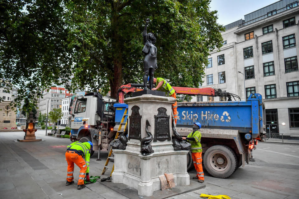 Contractors prepare to remove A Surge of Power (Jen Reid) 2020, by prominent British sculptor Marc Quinn, which has been installed in Bristol on the site of the fallen statue of the slave trader Edward Colston.