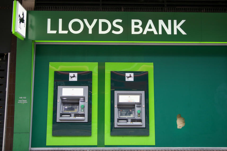 Lloyds ATM machines seen outside one of its branches