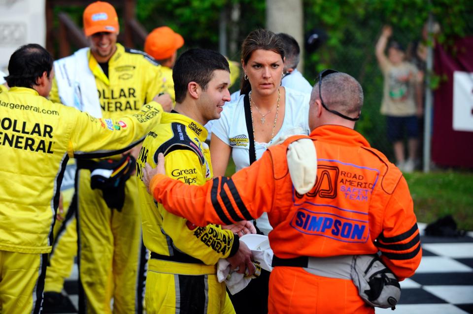 Reed Sorenson receives medical attention after getting sick after his win in the 2011 Bucyrus 200.