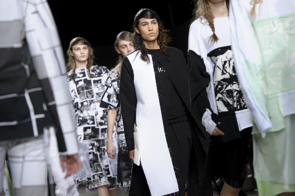 Models wear designs created by Louise Alsop part of Fashion East during London Fashion Week Autumn/Winter 2014, at the Tate Modern in central London, Tuesday, Feb. 18, 2014. (Photo by Jonathan Short/Invision/AP)