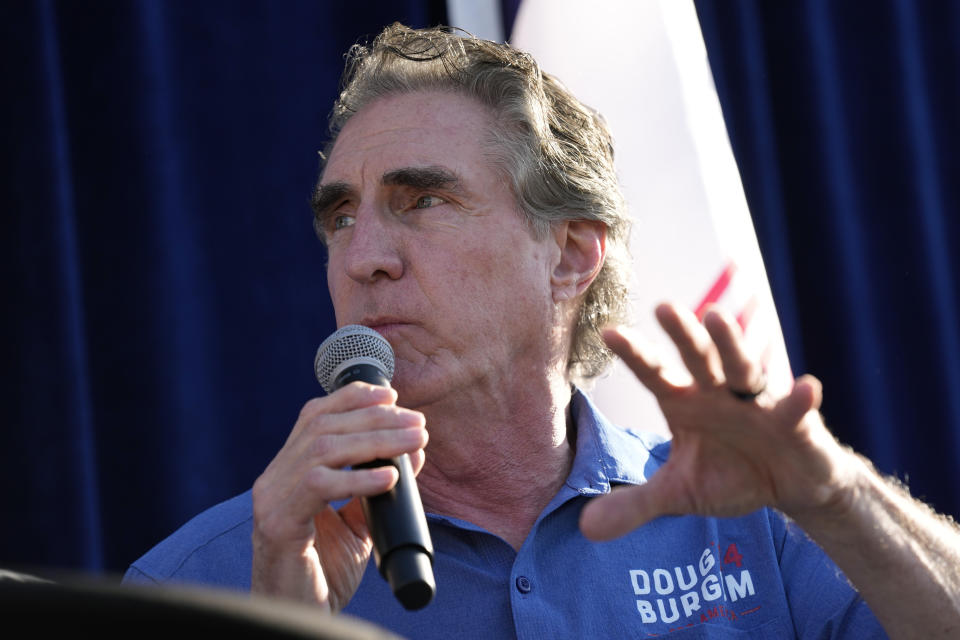 Republican presidential candidate North Dakota Gov. Doug Burgum speaks during a Fair-Side Chat with Iowa Gov. Kim Reynolds at the Iowa State Fair, Friday, Aug. 11, 2023, in Des Moines, Iowa. (AP Photo/Charlie Neibergall)