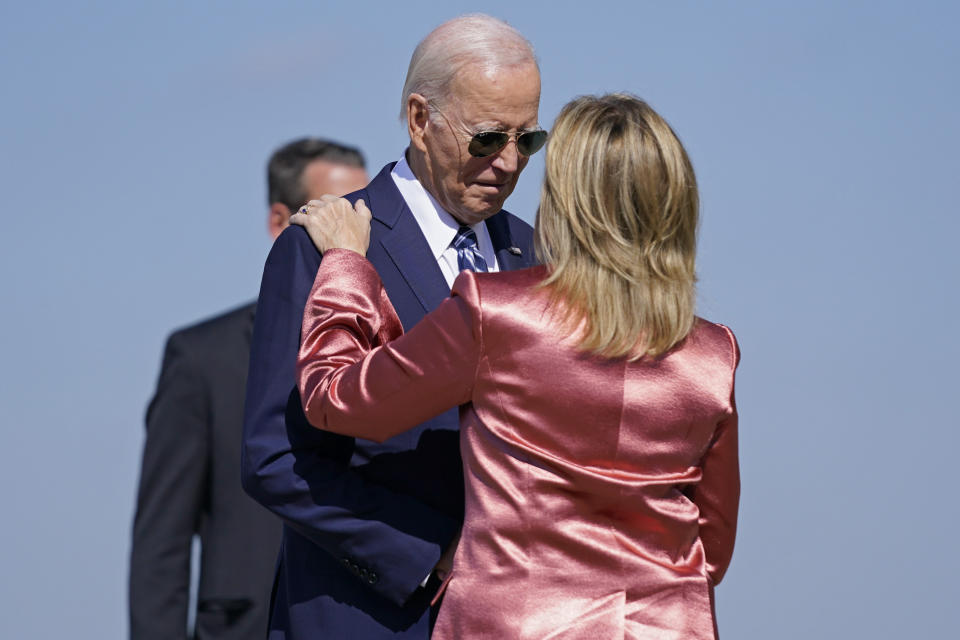 President Joe Biden greets Rep. Madeleine Dean, D-Pa., as he arrives to board Air Force One for a trip to Philadelphia to discuss clean energy, Oct. 13, 2023, at Andrews Air Force Base, Md. Despite a successful off-year election for Democrats, there remains a persistent fear within the party that there is a serious disconnect between the popularity of President Joe Biden's agenda and the man himself. (AP Photo/Evan Vucci, File)