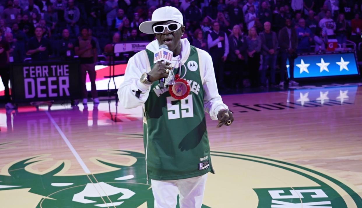 Flavor Flav sings the National Anthem before the Milwaukee Bucks game against the Atlanta Hawks Sunday, October 29, 2023 at Fiserv. Forum in Milwaukee, Wisconsin.