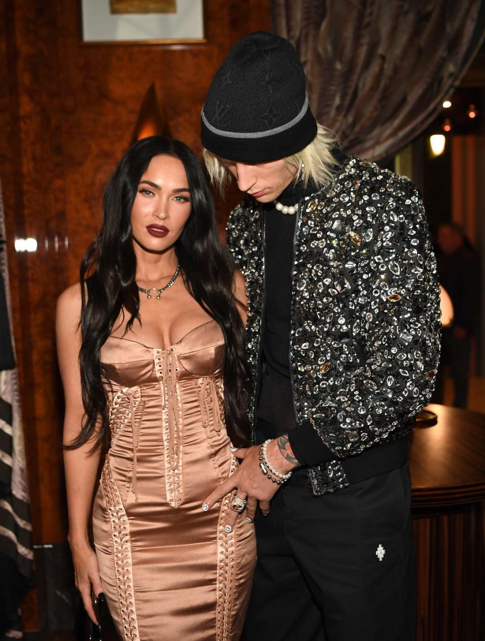 <p>The actor wore a nude-coloured Dolce & Gabbana corset dress with on a date with her boyfriend Machine Gun Kelly (also in Dolce & Gabbana) at the UFC match and grand opening of Delilah at Wynn Las Vegas on July 10, 2021. </p><p>She styled the look with a chunky silver chain and a maroon-coloured lipstick. </p>